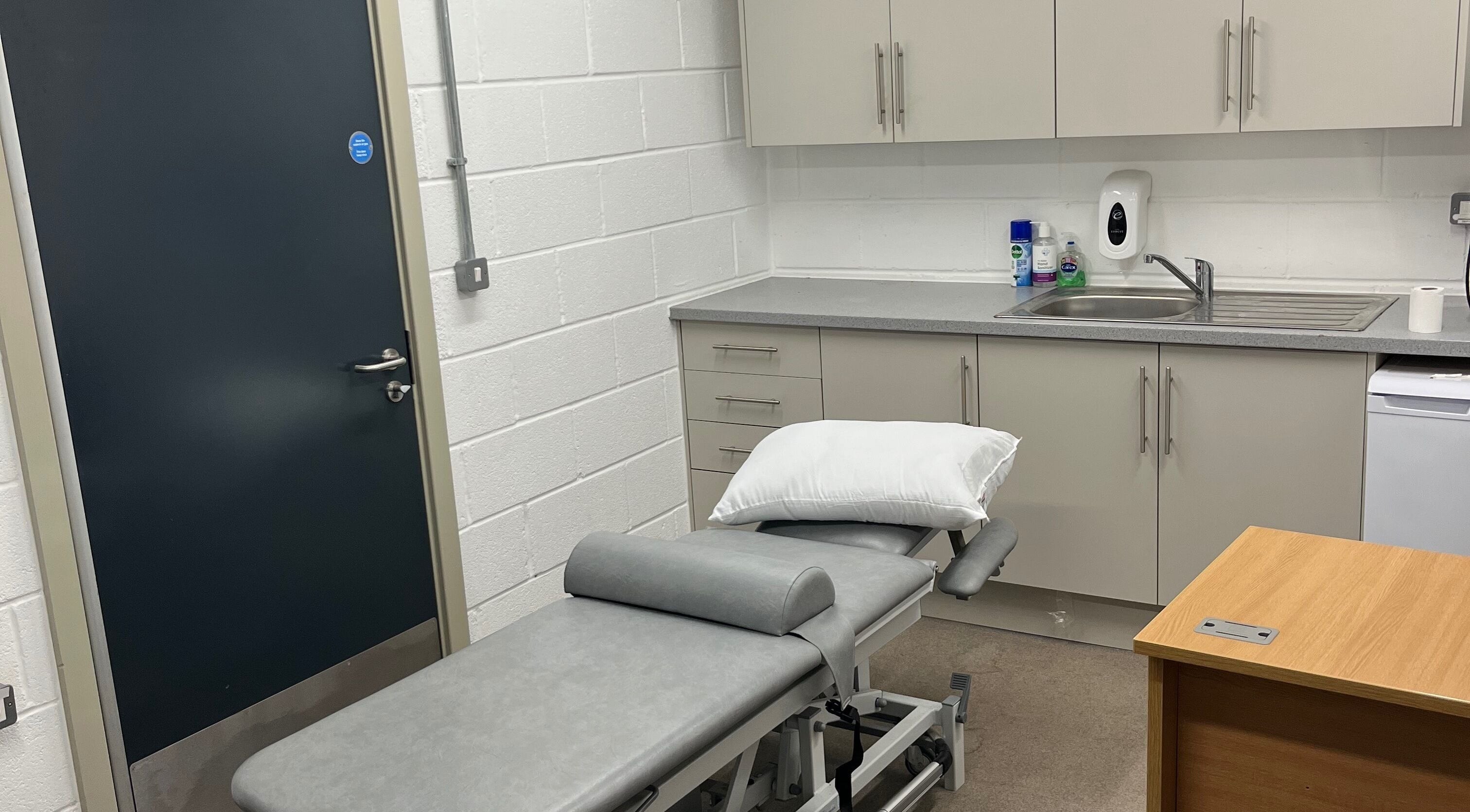 Professional therapy room at LH Sport Therapy in Mumbles, Newton, Wales, GB with treatment table.