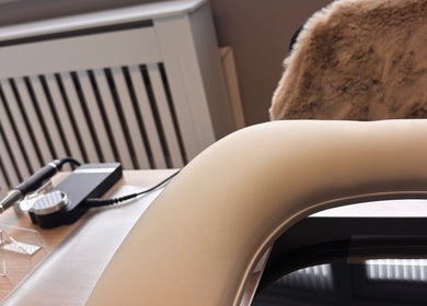 Luxurious treatment chair at Sculpted Studio, Cwmtillery, Wales, GB, offers comfort and elegance.