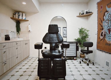 Tattoo chair in Altar Sheffield, a beauty venue in Sheffield, England, GB, with eclectic decor and serene ambiance.