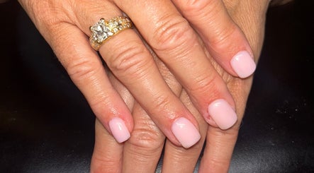 Elegant pink nails with a diamond ring at Rose Dipped Nails, Southampton, England, GB.