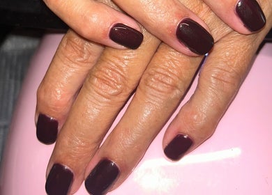 Dark plum manicured nails at Rose Dipped Nails, Southampton, England, GB