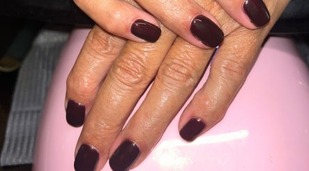 Dark plum manicured nails at Rose Dipped Nails, Southampton, England, GB