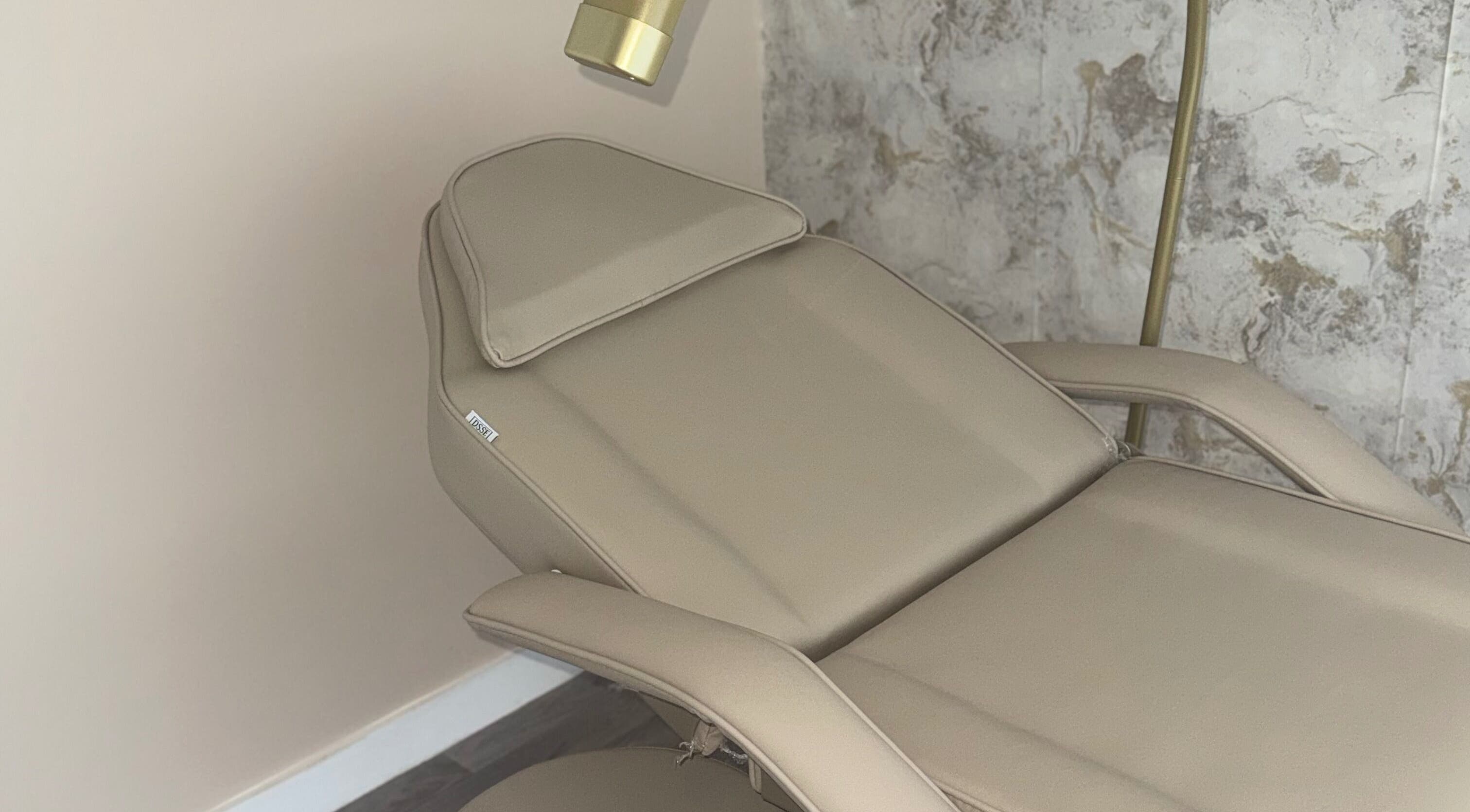 Elegant cream treatment chair at Kippax - Go Beyond Aesthetics and Laser, Kippax, England, GB.
