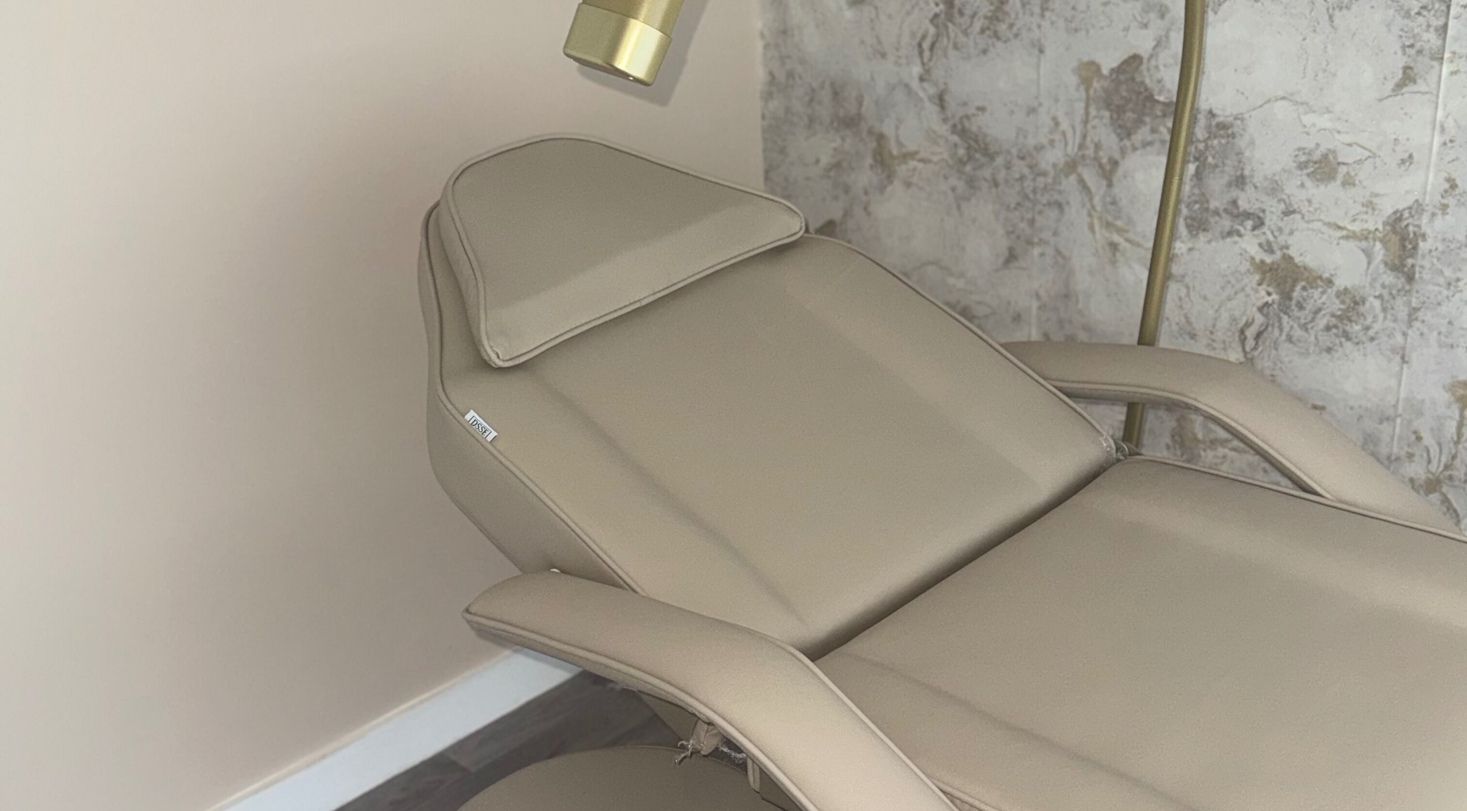 Elegant cream treatment chair at Kippax - Go Beyond Aesthetics and Laser, Kippax, England, GB.
