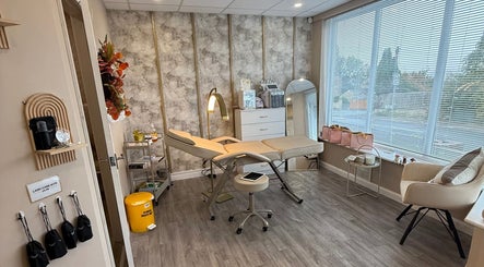 Modern beauty treatment room at Go Beyond Aesthetics and Laser in Pudsey, England, GB, with stylish decor.
