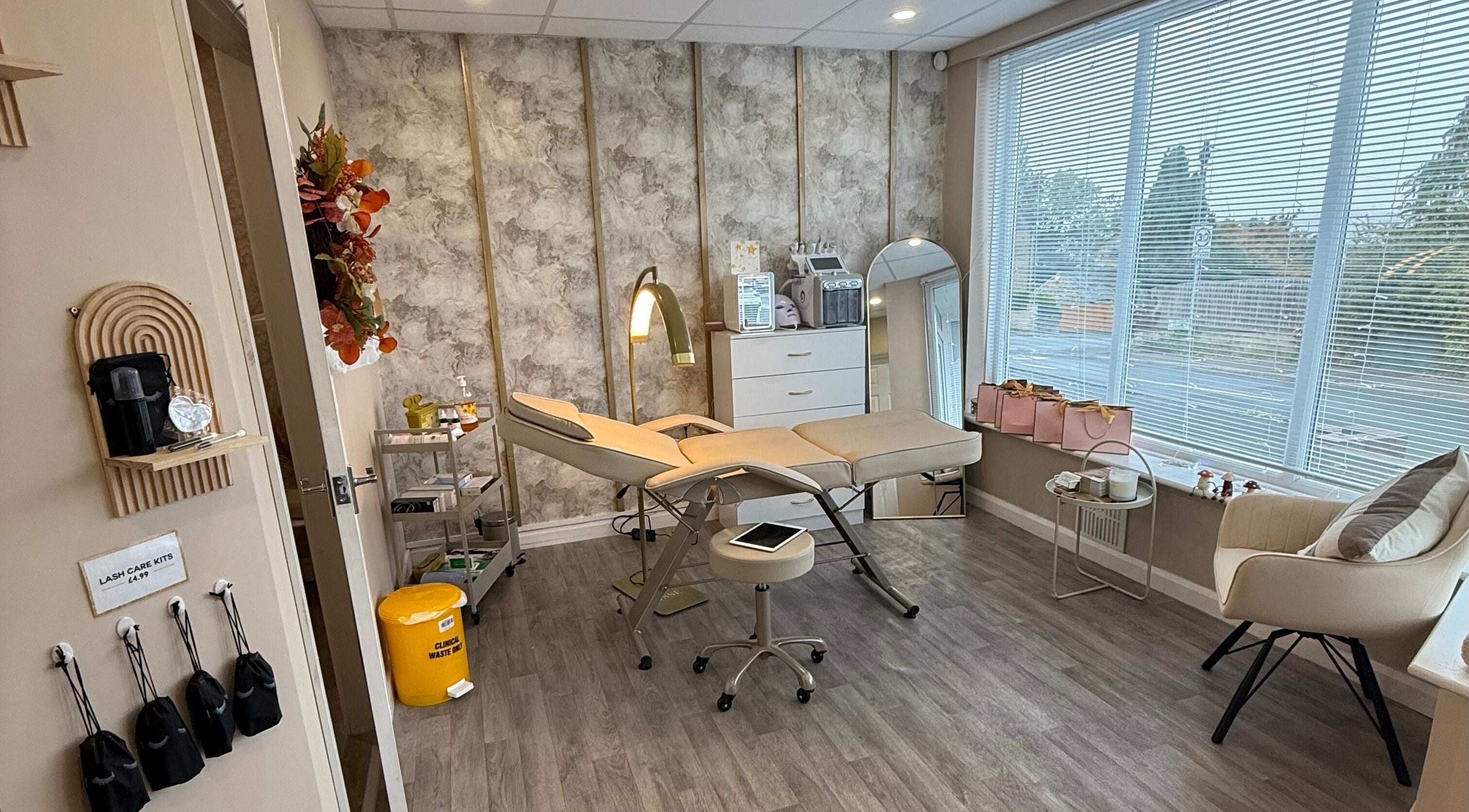 Elegant treatment room at Go Beyond Aesthetics and Laser in Pudsey, England, GB with modern decor and cozy ambiance.