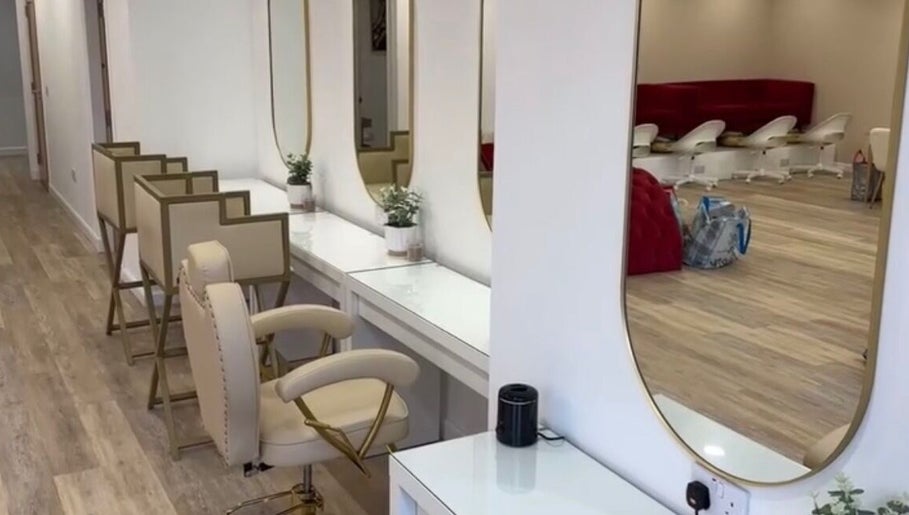Chic, modern interior of Hair By Diaz Kidd, Inverurie, Scotland, GB with stylish seating and mirrors.