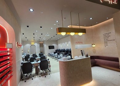Modern interior of Professionail | Burwood featuring stylish decor and nail salon chairs, Burwood, New South Wales, AU.