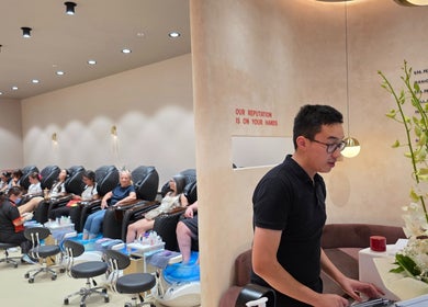 Professionail | Burwood salon interior showcasing a busy nail treatment area in Burwood, New South Wales, AU.