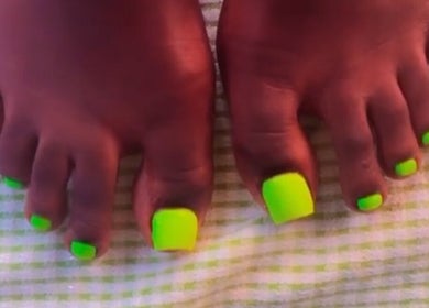 Bright neon green toenail art at The Nail Addict in Bridgetown, Saint Michael, BB.