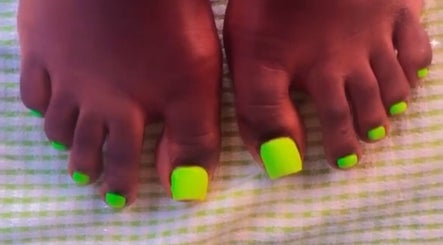 Bright neon green toenail art at The Nail Addict in Bridgetown, Saint Michael, BB.