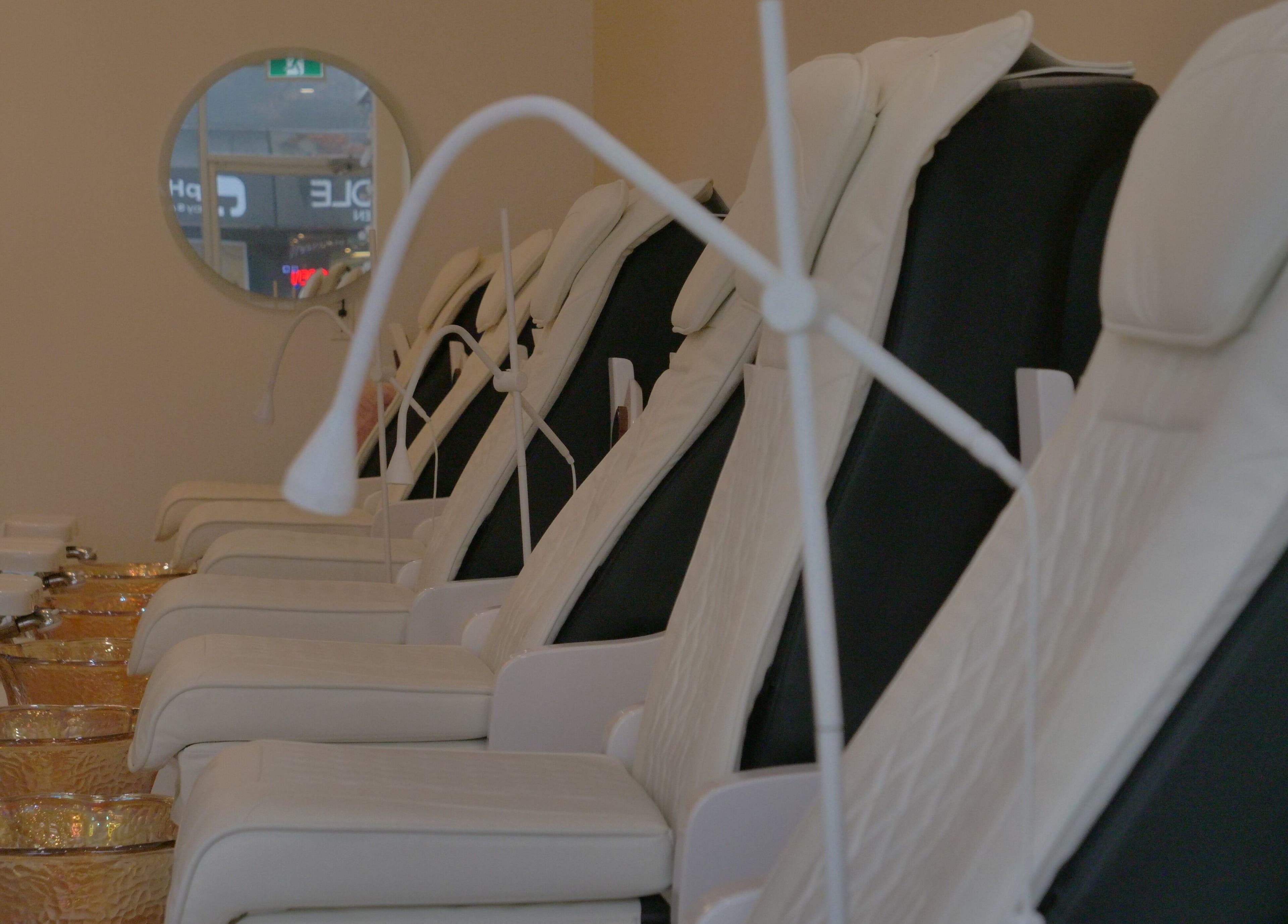 Elegant pedicure chairs at Sugar Nails and Lashes - Kitsilano, Vancouver, BC, CA enhancing relaxation.