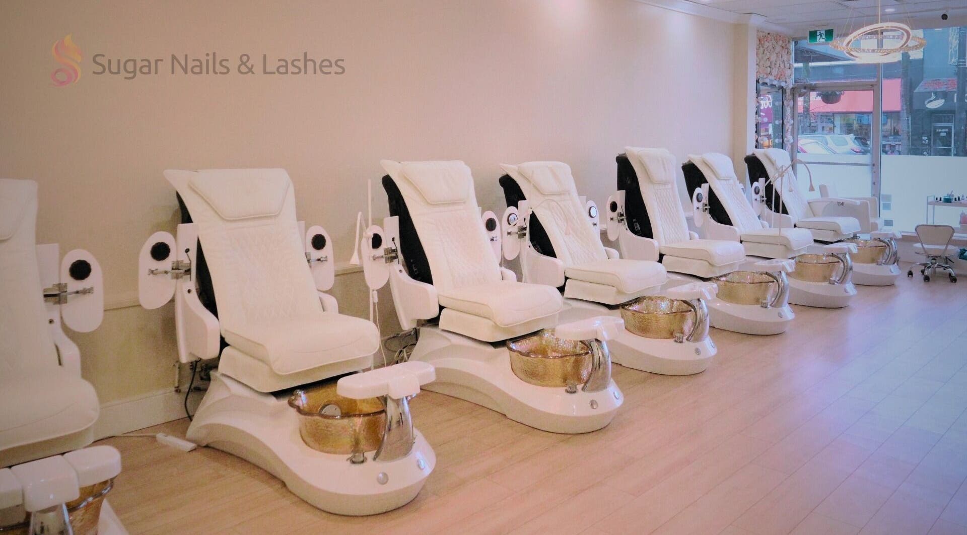 Pedicure chairs at Sugar Nails and Lashes - Kitsilano in Vancouver, BC, CA, offering luxury nail services.