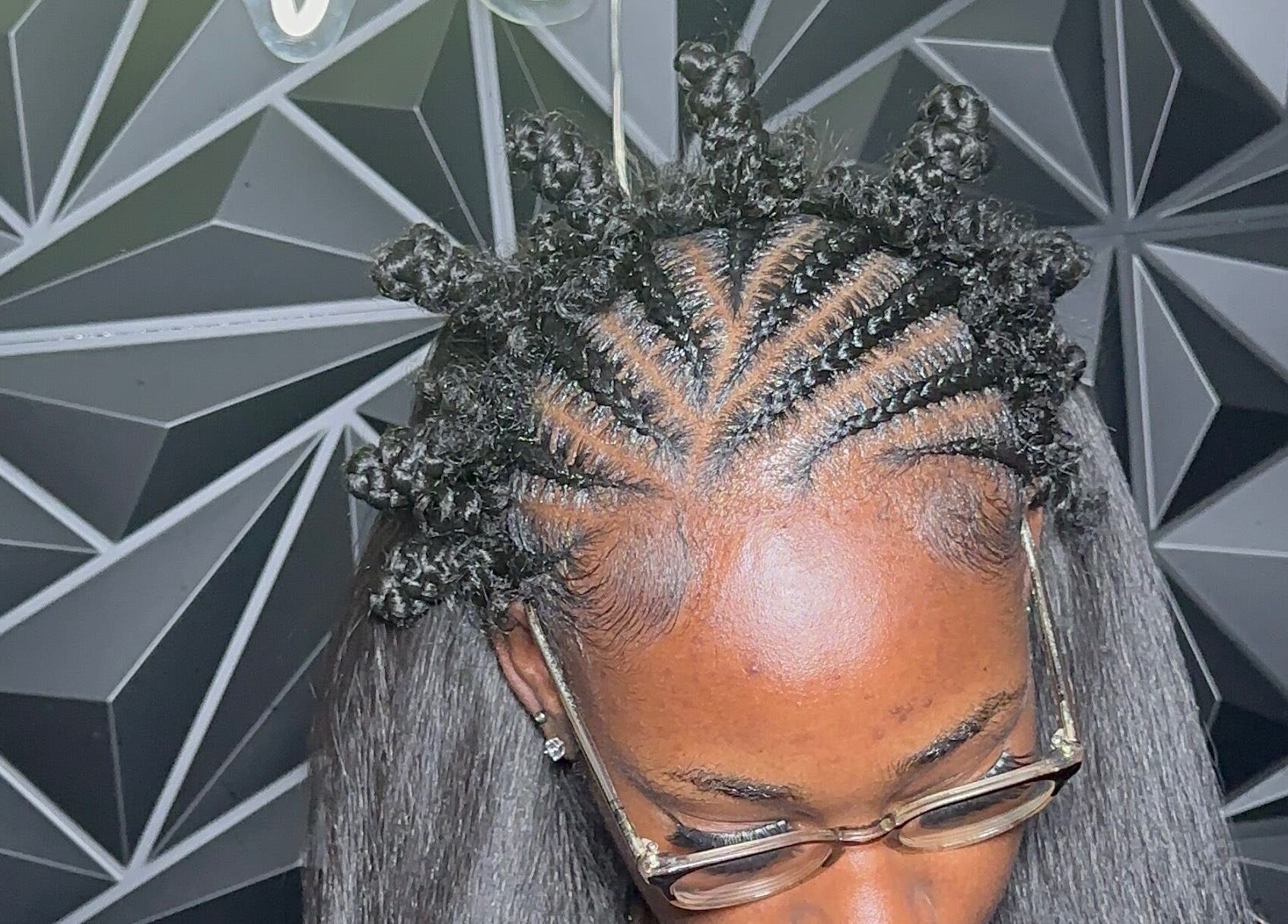 Intricate braided hairstyle at Braid Haven in Nassau, New Providence, BS.