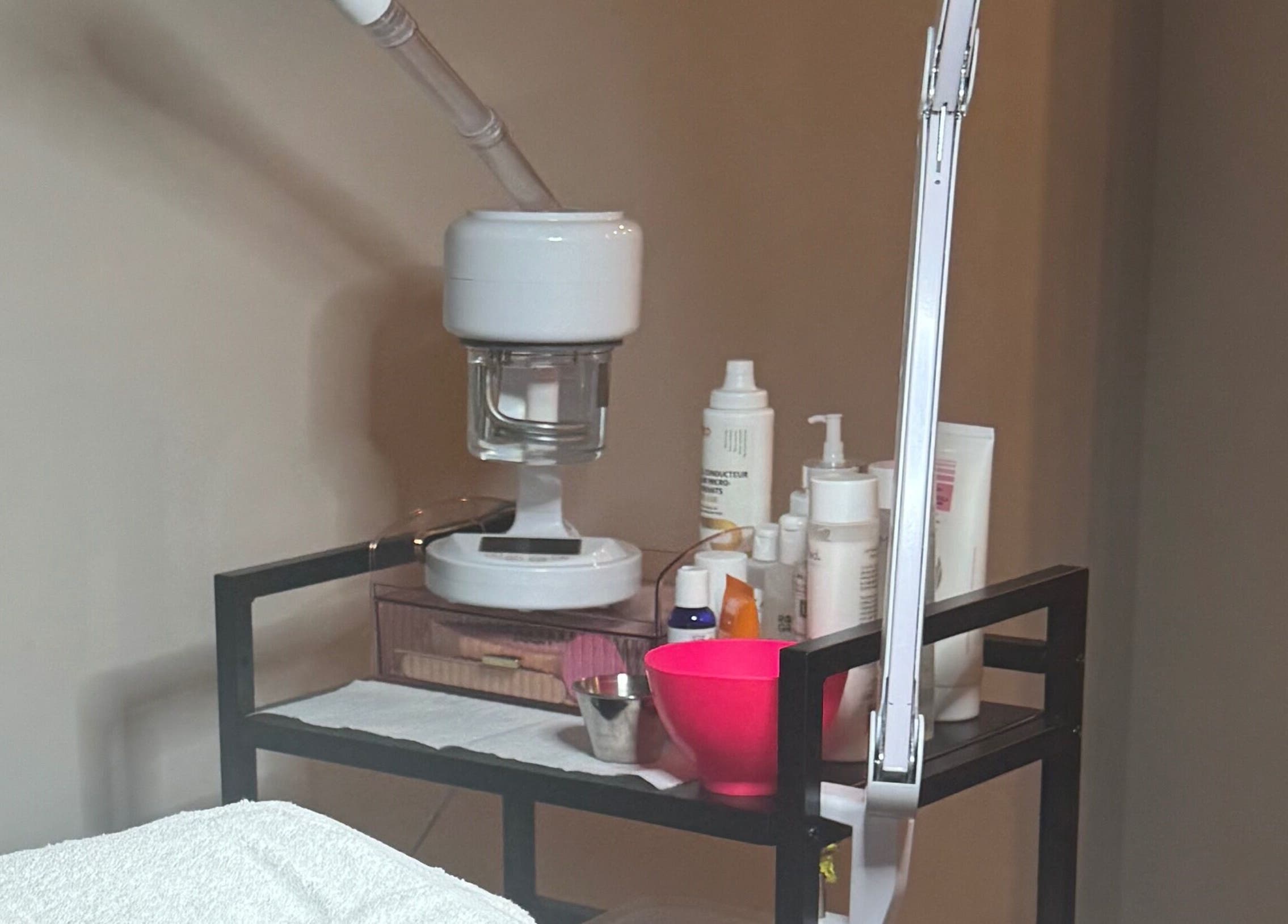 The Radiantix Spa treatment cart in Toronto, Ontario, CA, featuring skincare products and tools.