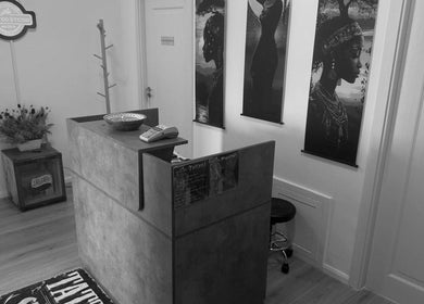 Reception area at The InkSpot Tattoo Sibiu, featuring art and cozy decor in Sibiu, Județul Sibiu, RO.