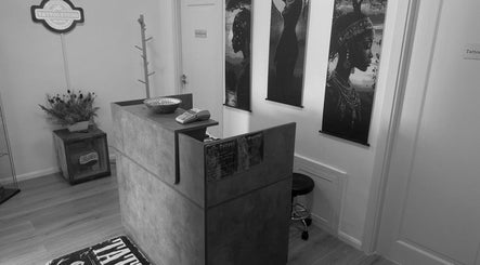 Reception area at The InkSpot Tattoo Sibiu, featuring art and cozy decor in Sibiu, Județul Sibiu, RO.