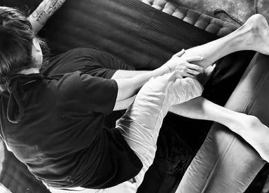 Therapist giving a relaxing massage at Muka Concepts X Bambu Indah in Bali, Bali, ID.