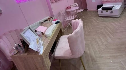 Cozy pink decor and nail station in Dollys Studio, Bradford, England, GB.