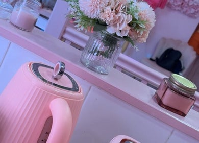 Elegant pink decor and flowers at Dollys Studio, Bradford, England, GB, creating a serene ambiance.