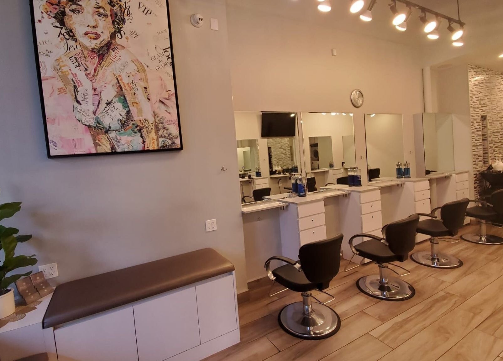 Tribeca Hair Studio NYC features modern styling chairs and chic decor in New York, New York, US.