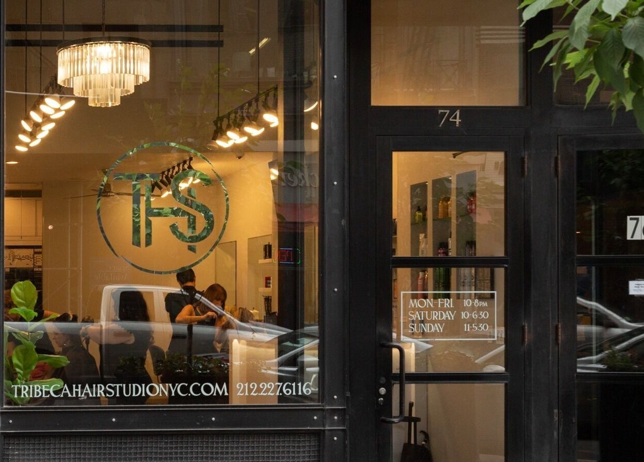 Front of Tribeca Hair Studio NYC showing stylish salon interior in New York, New York, US.