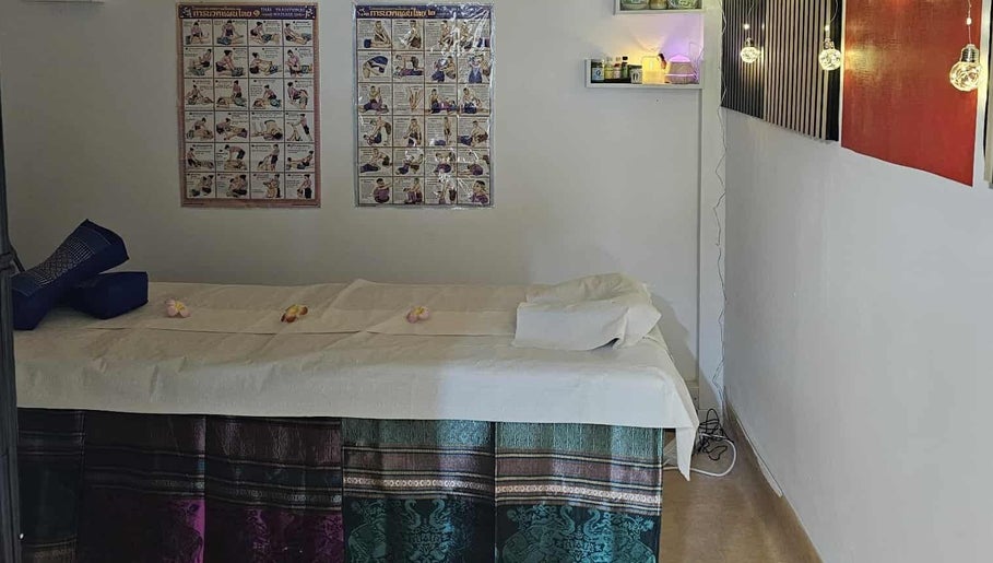 Massage therapy room at Jasmine Thai Massage, Swindon, England, GB with serene decor and lighting.