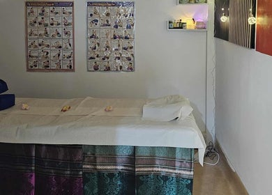 Massage therapy room at Jasmine Thai Massage, Swindon, England, GB with serene decor and lighting.