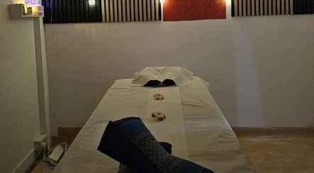 Massage room setup at Jasmine Thai Massage in Swindon, England, GB, showcasing a relaxing ambiance.