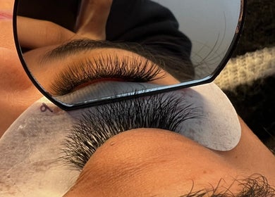 Reflection of eyelash extensions at KuratedbyKirsty, Roodepoort, Gauteng, ZA, showcasing beauty details.