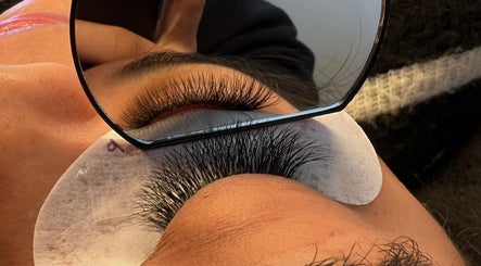 Reflection of eyelash extensions at KuratedbyKirsty, Roodepoort, Gauteng, ZA, showcasing beauty details.