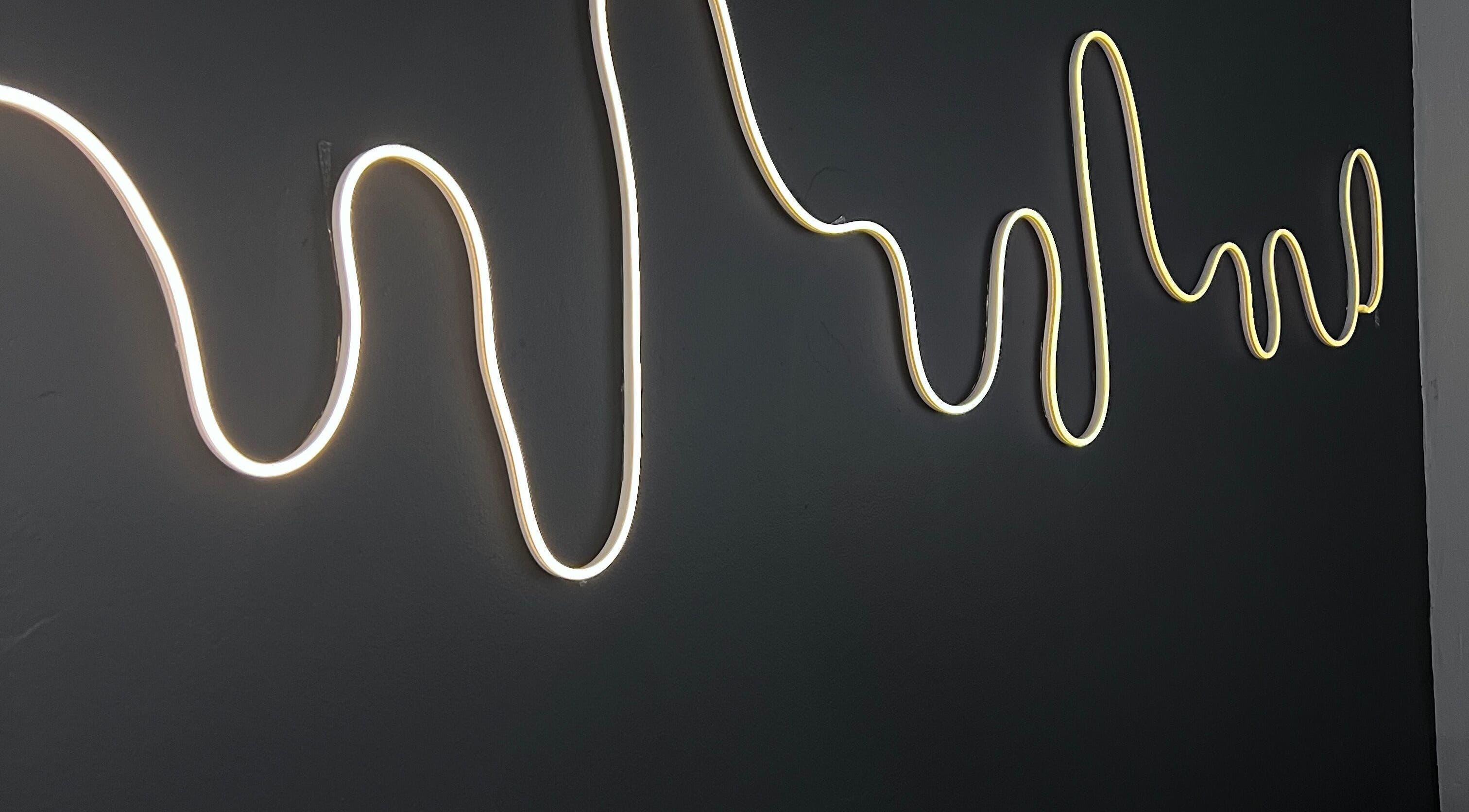 Stylish neon wave light decor at Kurated by Kirsty in Gqeberha, Eastern Cape, ZA.