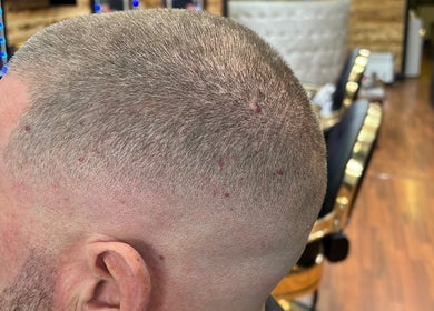Clean buzz cut at Himan mobile barber, Lichfield, England, GB showcasing modern hair styling.