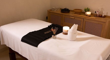 Relaxing massage table setup at Foot First Spa, Riyadh, Riyadh Province, SA with calm ambiance.