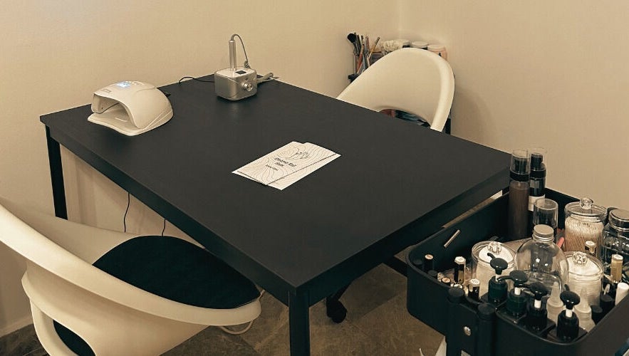 Modern nail care station at Wisteria Nail Haus, Abu Dhabi, Abu Dhabi, AE, showcasing tools and products.