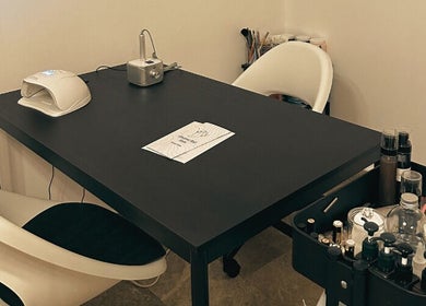 Modern nail care station at Wisteria Nail Haus, Abu Dhabi, Abu Dhabi, AE, showcasing tools and products.
