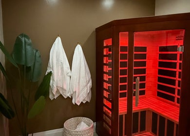Cozy sauna at Golden Sweat, London, Ontario, CA, offering a relaxing and rejuvenating experience with warm infrared light.