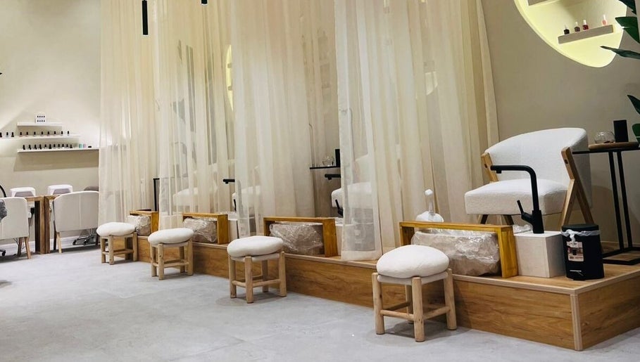 Serene pedicure area at Jehan Touch, خميس مشيط, عسير, SA, with elegant decor and soft lighting.