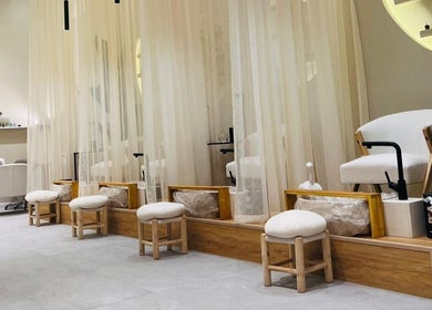 Serene pedicure area at Jehan Touch, خميس مشيط, عسير, SA, with elegant decor and soft lighting.