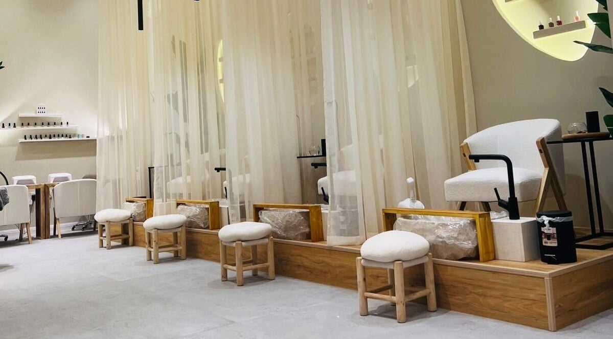 Serene pedicure area at Jehan Touch, خميس مشيط, عسير, SA, with elegant decor and soft lighting.