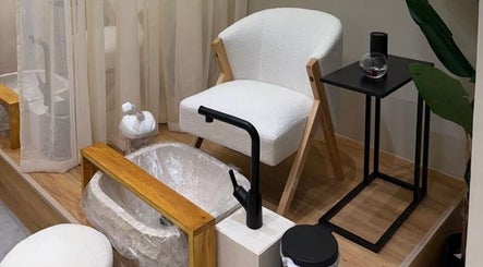 Cozy pedicure station at Jehan Touch, خميس مشيط, عسير, SA featuring stylish white chair and modern decor.