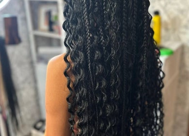 Intricate braids styled at EMbraid Studio in Christchurch, Canterbury Region, NZ, showcasing detailed craftsmanship.