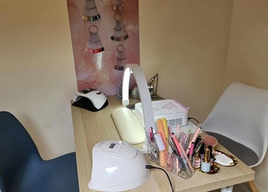 Cozy nail station at Satori Nails in Peterborough, England, GB, showcasing tools and decor.