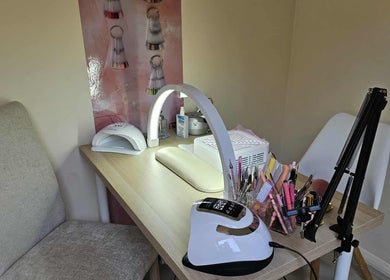 Modern nail station at Satori Nails, Peterborough, England, GB, featuring tools and decor in a serene setting.