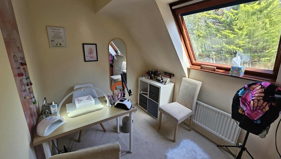 Inviting interior of Satori Nails in Peterborough, England, GB, featuring a well-lit nail station and bright decor.