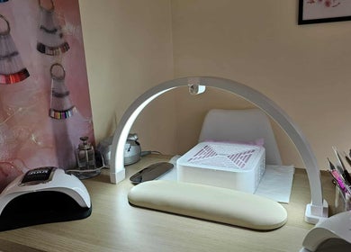 Satori Nails station with modern tools in Peterborough, England, GB, highlighting nail art samples.