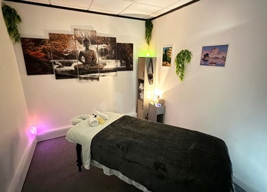Peaceful massage room at The Stress Compress, Manchester, England, GB with serene decor and relaxing ambiance.