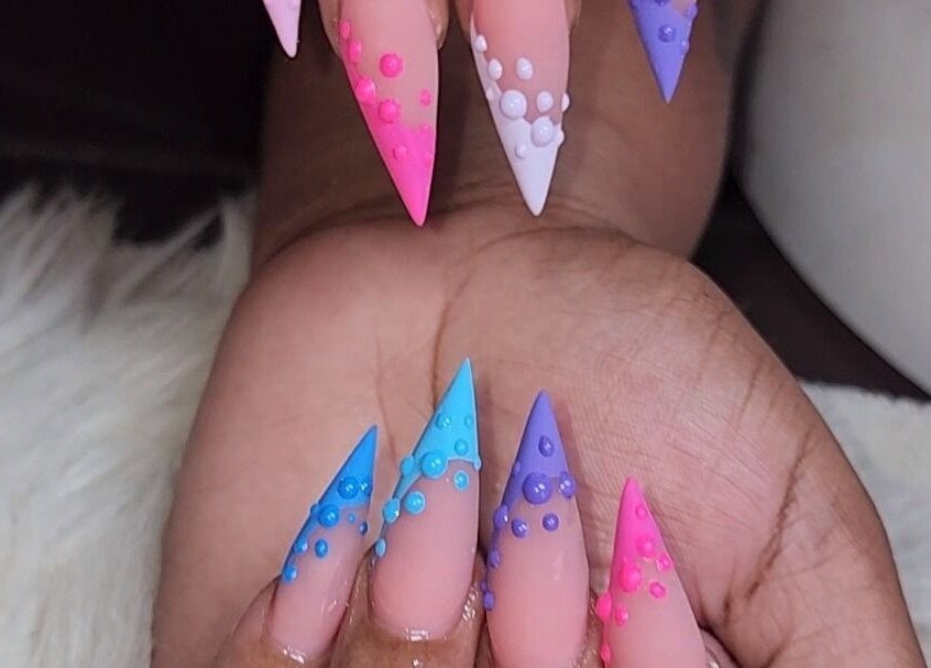 Colorful nail art design at Object of Beauty Studio, Saint James, Saint James, BB showcasing vibrant styles.