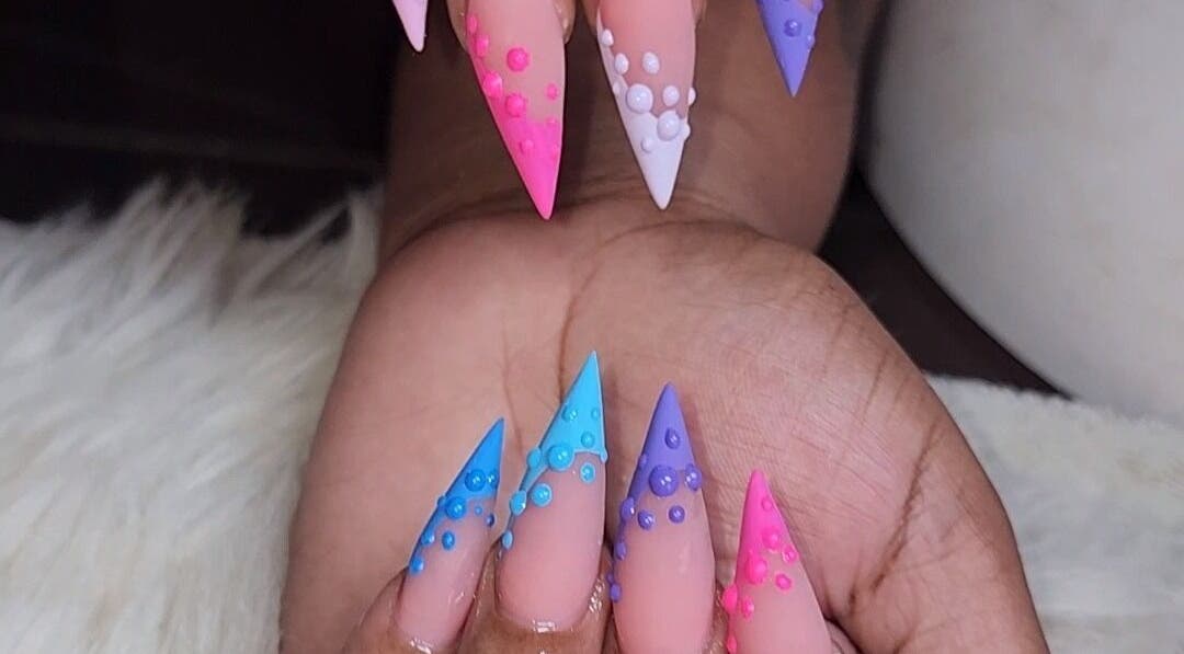 Colorful nail art design at Object of Beauty Studio, Saint James, Saint James, BB showcasing vibrant styles.