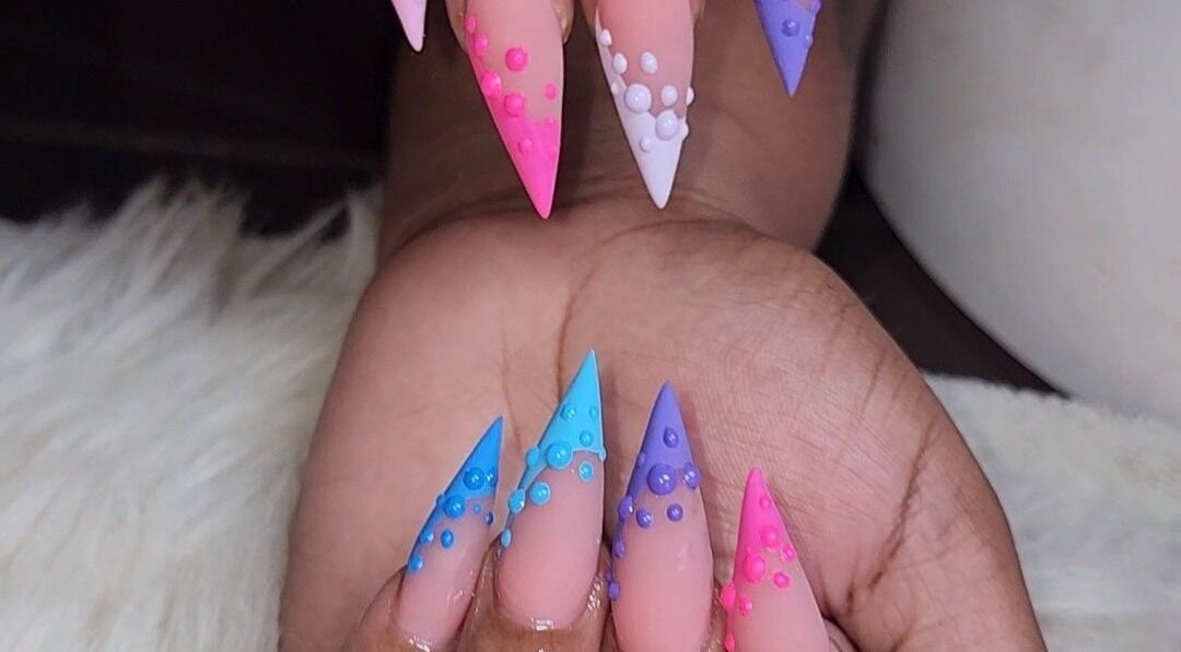 Colorful nail art design at Object of Beauty Studio, Saint James, Saint James, BB showcasing vibrant styles.